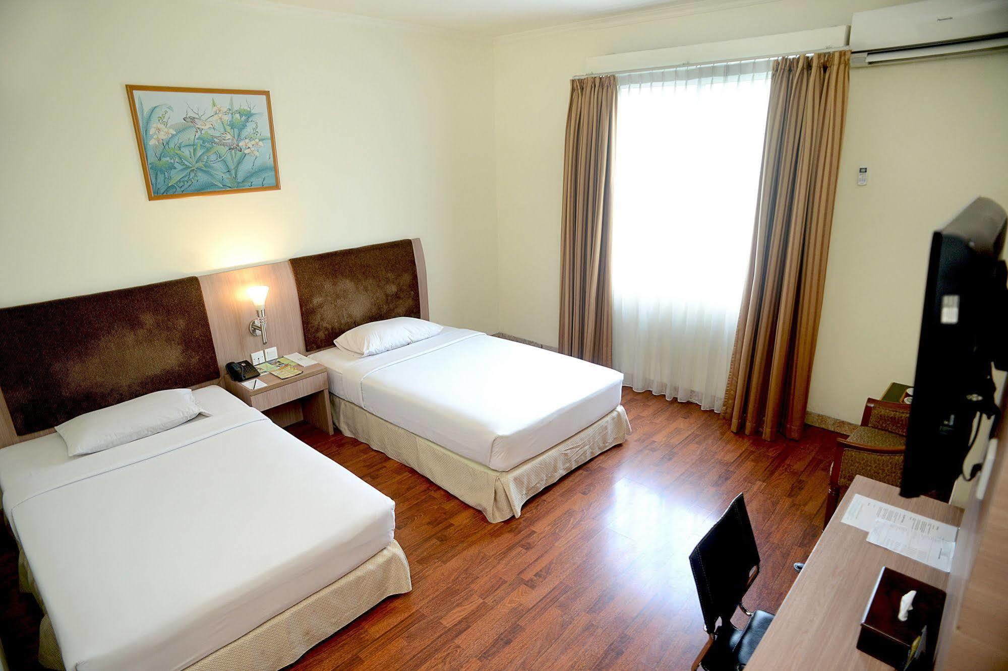 Hotel Anugerah Palembang Esterno foto